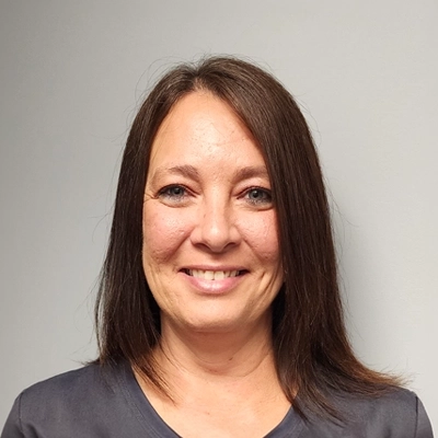 Office Manager Jill Lyvere Smiling